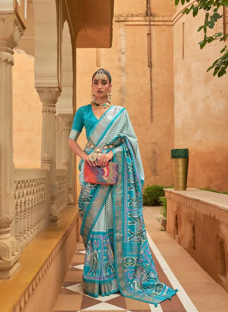 Sky Blue   Patola Saree for Women With Contrast Patola Embellished Border And Very Soft Flowy Lightweight Silk