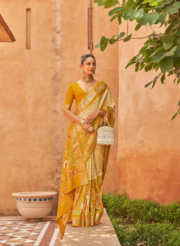 Yellow  Patola Saree for Women With Contrast Patola Embellished Border And Very Soft Flowy Lightweight Silk