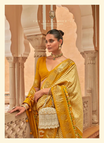 Yellow  Patola Saree for Women With Contrast Patola Embellished Border And Very Soft Flowy Lightweight Silk