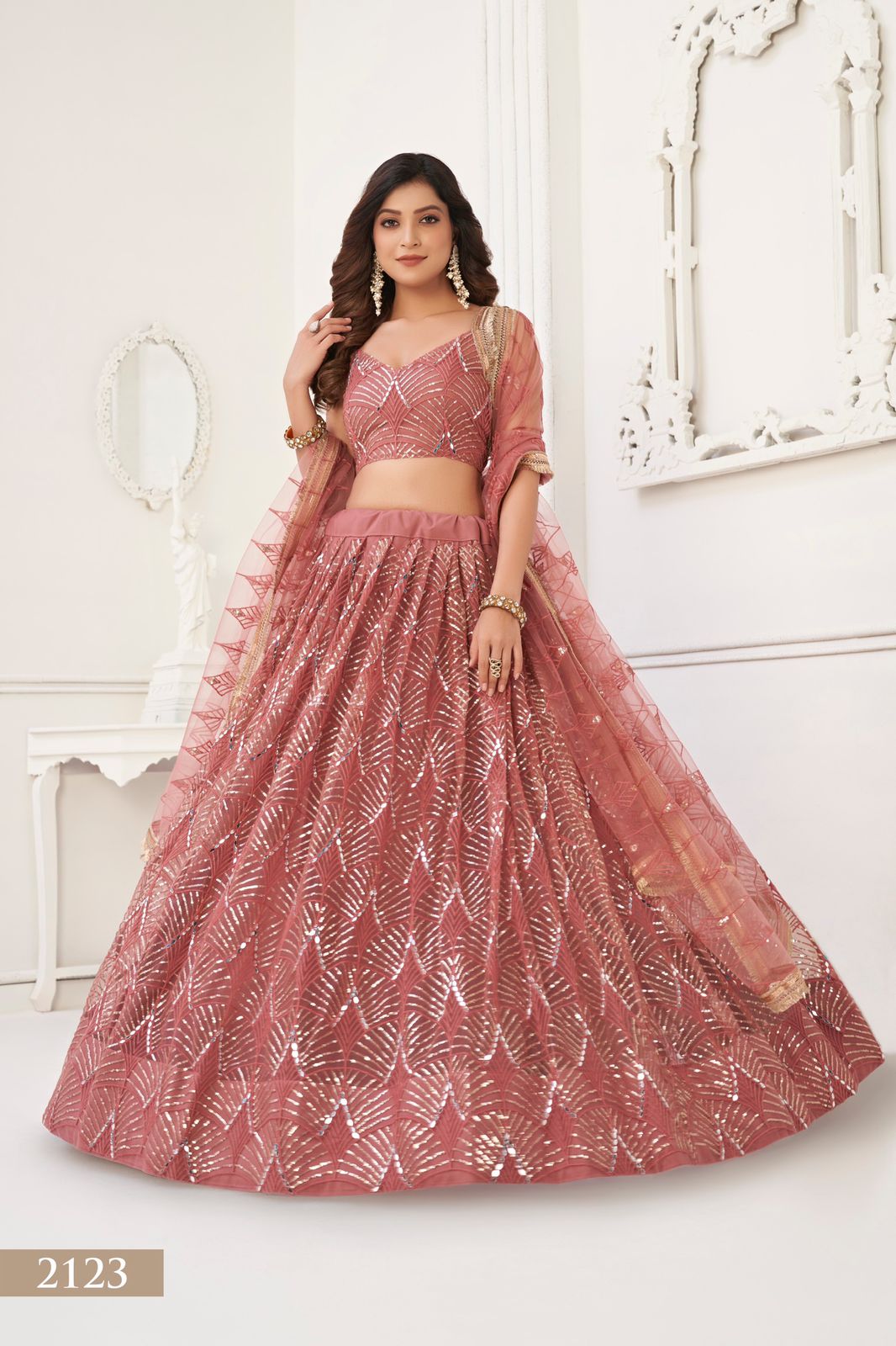Peach   Thread, Mirror and Sequence work Embroidery  lehenga choli with Net dupatta